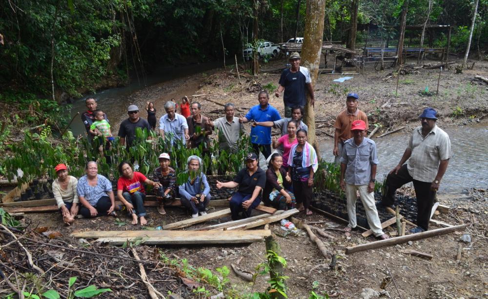 Residents of Ujat Bato Longhouse in Long Pilah, Sarawak at the nursery they have prepared with saplings