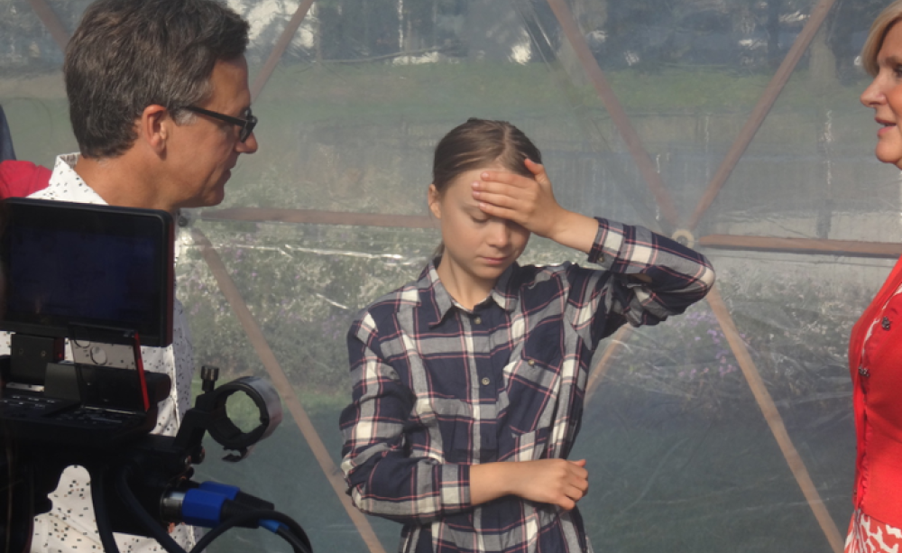 Greta Thunberg with artist Michael Pinsky inside the Pollution Pods at the UN Climate Summit,