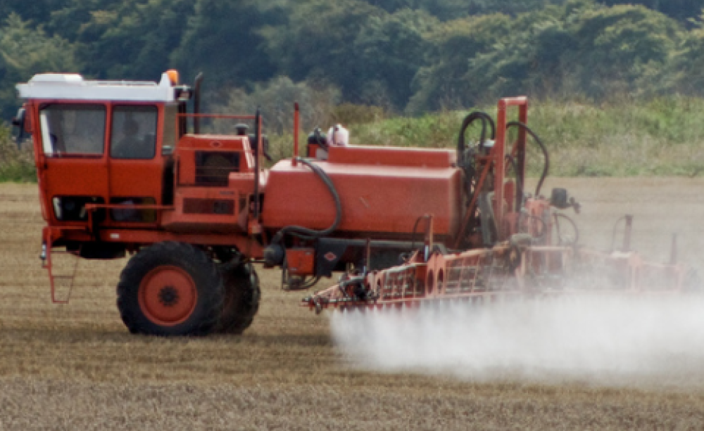 Crop spraying on a windy day. Photo: CropShot via Flickr.com.