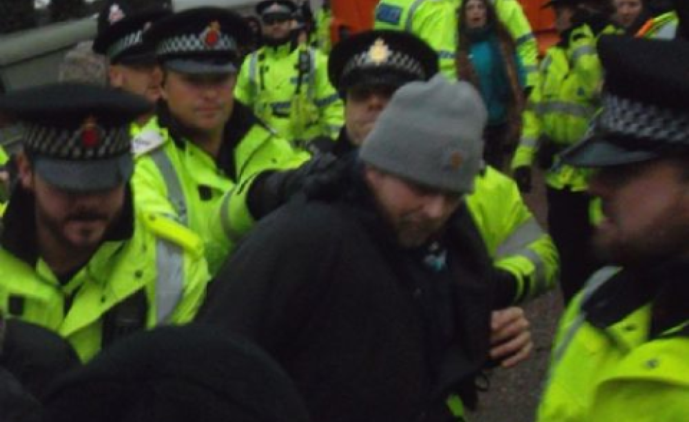 Arrested for walking on a public footpath. Photo: Salford Star.