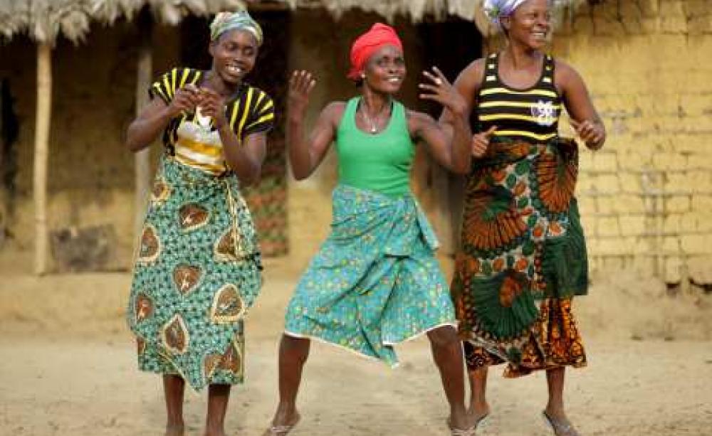 Celebrating. Photo: Jason Taylor for Friends of the Earth 2014.