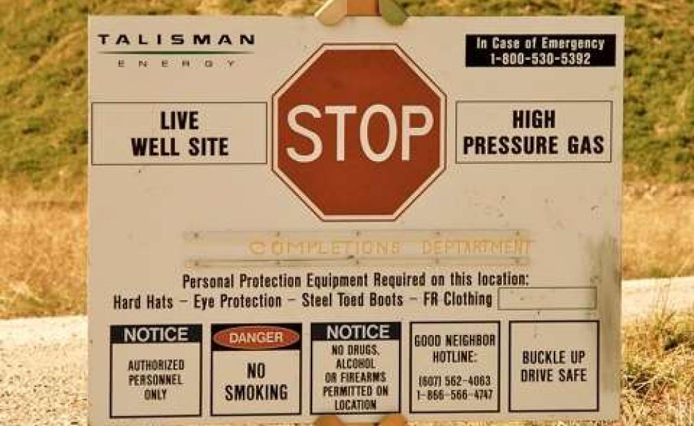 Mixed messages: a warning sign at a fracking site in Pennsylvania. Photo: Ostroff Law / Wikimedia Commons.