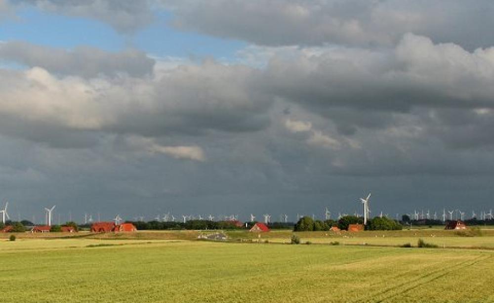 Landscape with hundreds of wind turbines close to the North Sea in Ostfriesland, Germany.