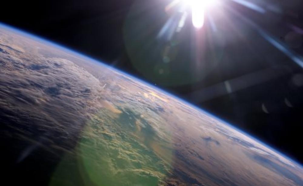 The answer to Earth's energy needs is floating in the skies above. Photo: Conceptual Image Lab, NASA's Goddard Space Flight Center. Earth photo courtesy of NASA/ISS Expedition 13 crew.