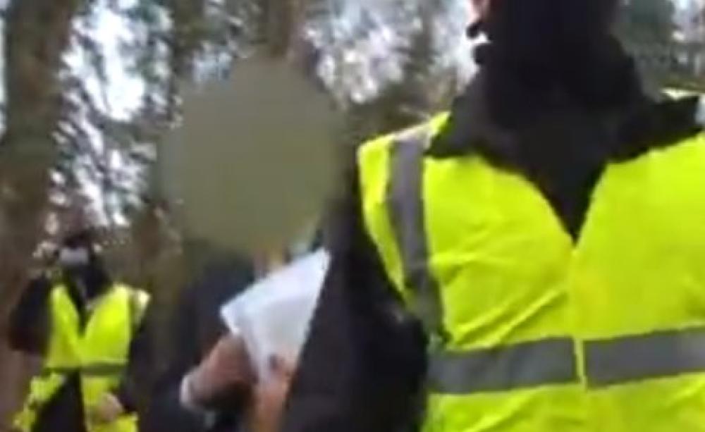 The moment when journalist and photographer Adrian Arbib was served with an injunction preventing him from photographing an environmental protest at Radley lakes, 2007. Photo: still from video by Adrian Arbib.