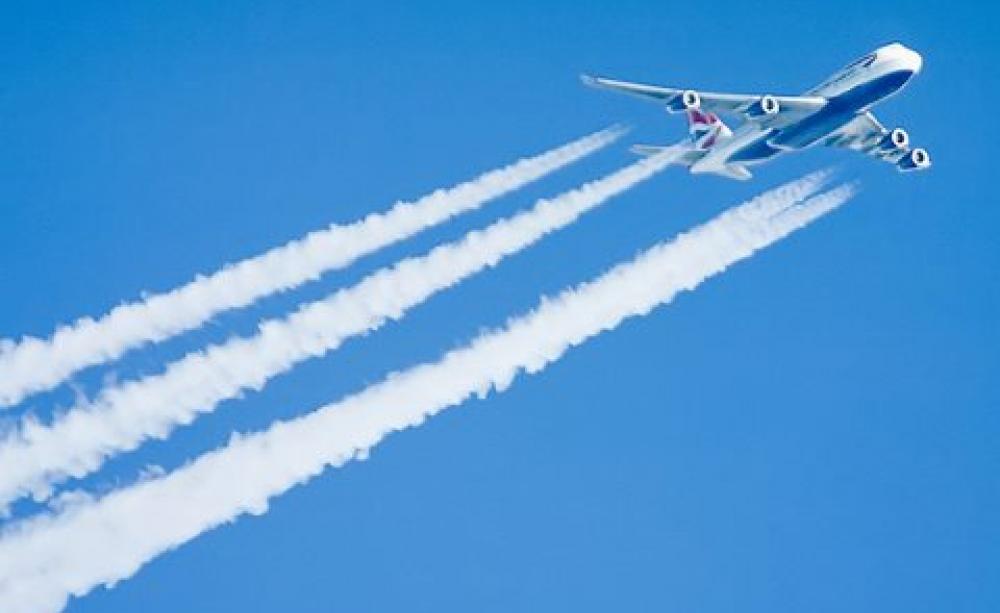 British Airways Boeing 747 contrail - taken from a Boeing 777 window somewhere over Netherlands. Photo: revedavion.com via Flickr, CC BY-SA 2.0. See aeroplanedream.blogspot.com.