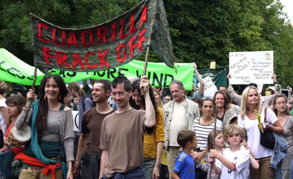 It's had an impact - on fracking companies' valuations: aAnti-fracking campaigners at Cuadrilla drilling site at Balcombe, West Sussex, August 2013. Photo: Sheila via Flickr (CC-BY-NC 2.0).
