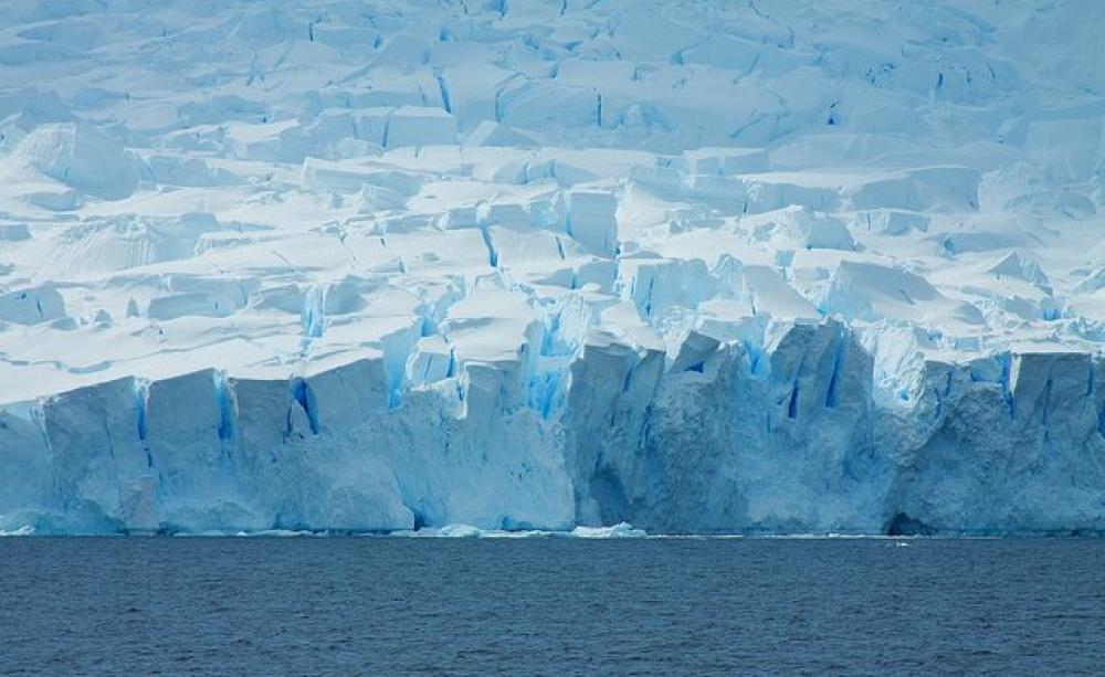 Where ice meets ocean - Antarctic coastline by McKay Savage via Flickr (CC BY 2.0).