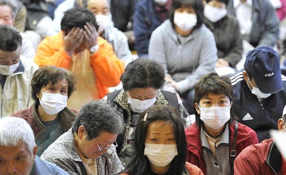 Now it's Japan's press that's muzzled. Residents of Iitate village, about 40 kilometers from the radiation-spewing Fukushima Dai-ichi nuclear plant, prepare fopr evacuation, 13th April 2011. Photo: Kyodo News via Irish Typepad on Flickr (CC BY-NC-ND 2.0).