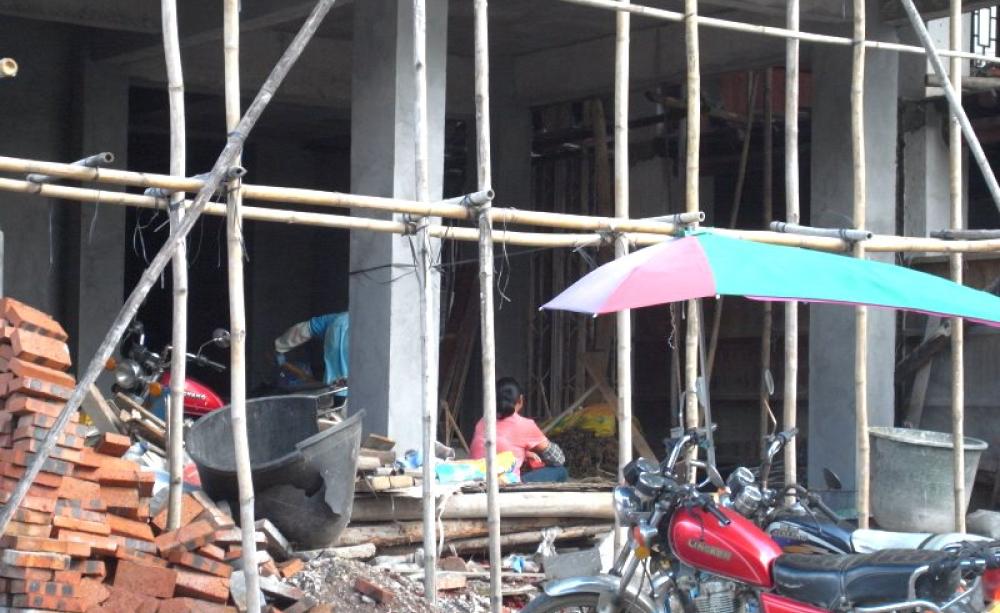 Precious little harmony here: a building site in Beijing. But change is on the way. Photo: Thembi Mutch.