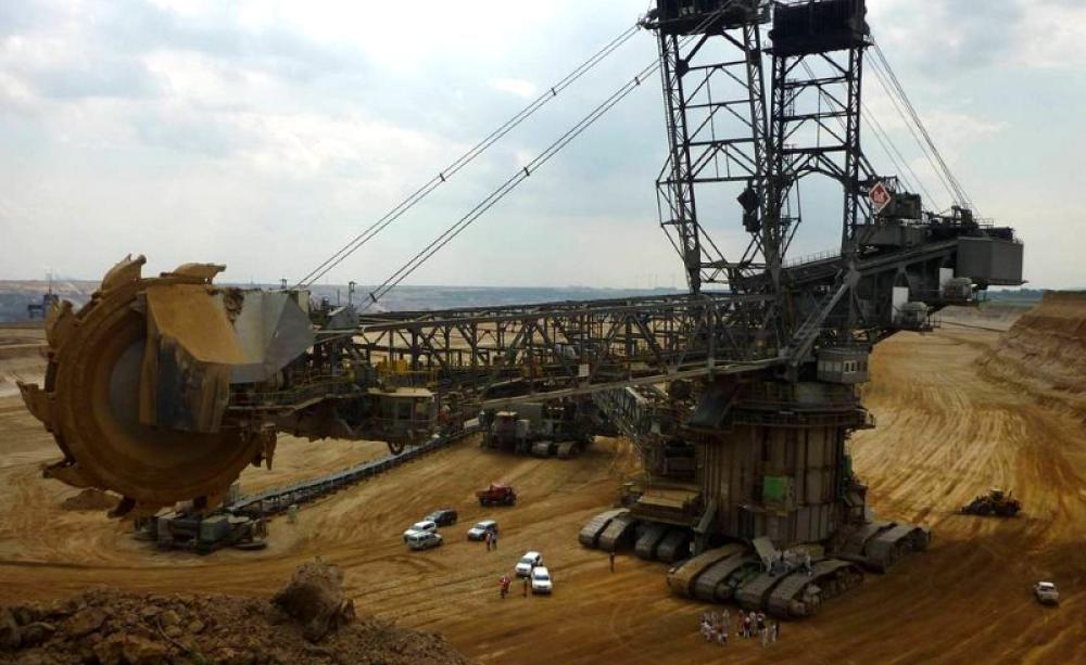 In August 2014 climate activists blocked a digger in one of the Rhineland open-pit coal mines. Protests will resume in August 2015. Photo: 350.org via Flickr (CC BY-NC-SA).