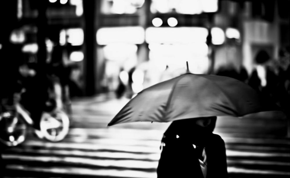 A rainy night in Hiroshima, March 2012. After the US's nuclear strike on 6th August 1945, 'back rain' carried out uranium nanoparticles that caused cancer among those ingesting them. Photo: Freedom II Andres via Flickr (CC BY).