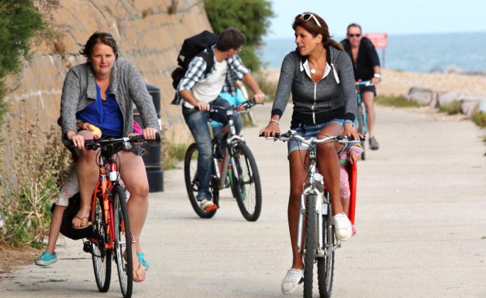 There's more to health and wellbeing than the NHS! Out cycling on the Folkestone to Hythe Coastpath last summer. Photo: Gareth Williams via Flickr (CC BY).