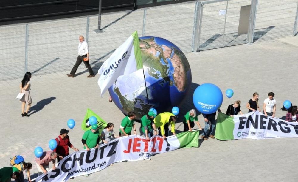 Protesters from Bund, the German FoE NGO, demand climate action now at the Bonn Climate Change Conference, 11 June 2015. But the delegates were unable to deliver. Photo: UNclimatechange via Flickr (CC BY).