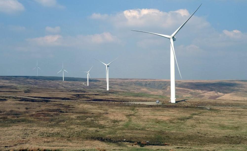 Scout Moor Wind Farm is the second largest onshore wind farm in England. But under current government policies, there won't be many more of these. Photo: Gidzy via Flickr (CC BY).