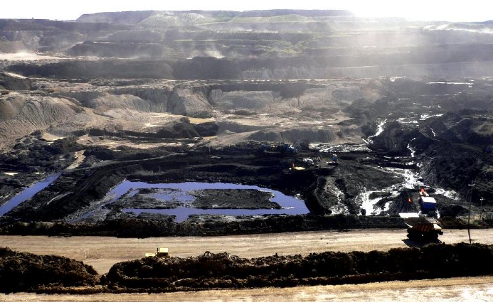 Is this what you want your pension fund to finance? Open pit coal mine near Hailar, Inner Mongolia. Photo: Herry Lawford via Flickr (CC BY).