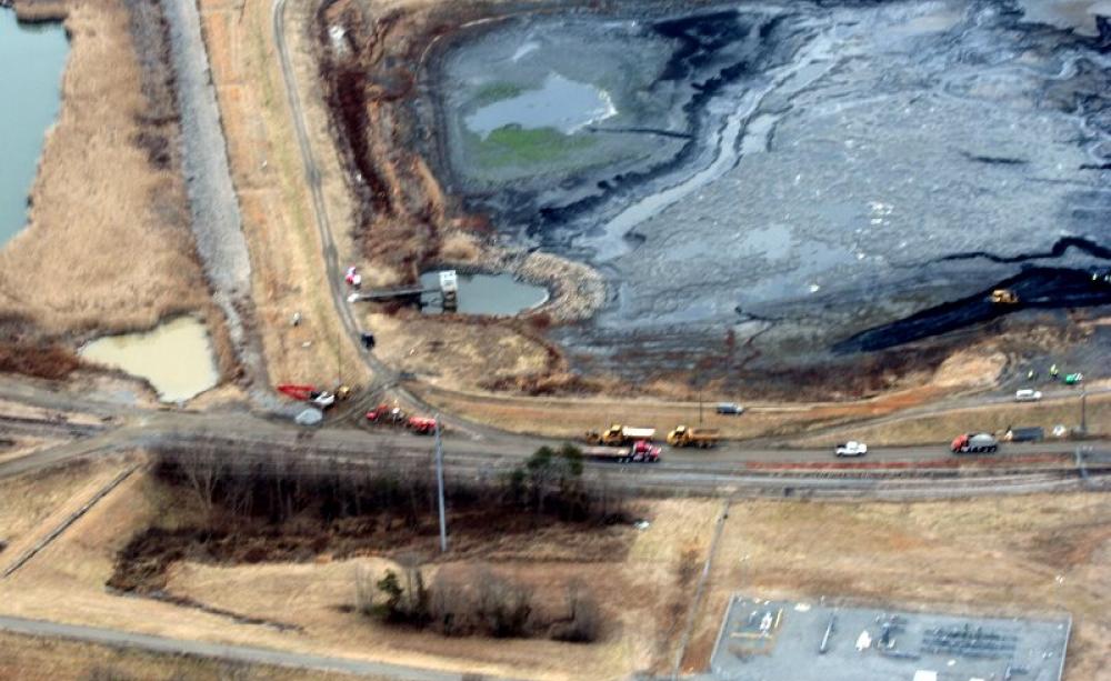 Dead trees in a Duke Energy Buck coal ash pond, 2014. Photo: Dot Griffith, Waterkeeper Alliance via Flickr (CC BY-NC-ND).