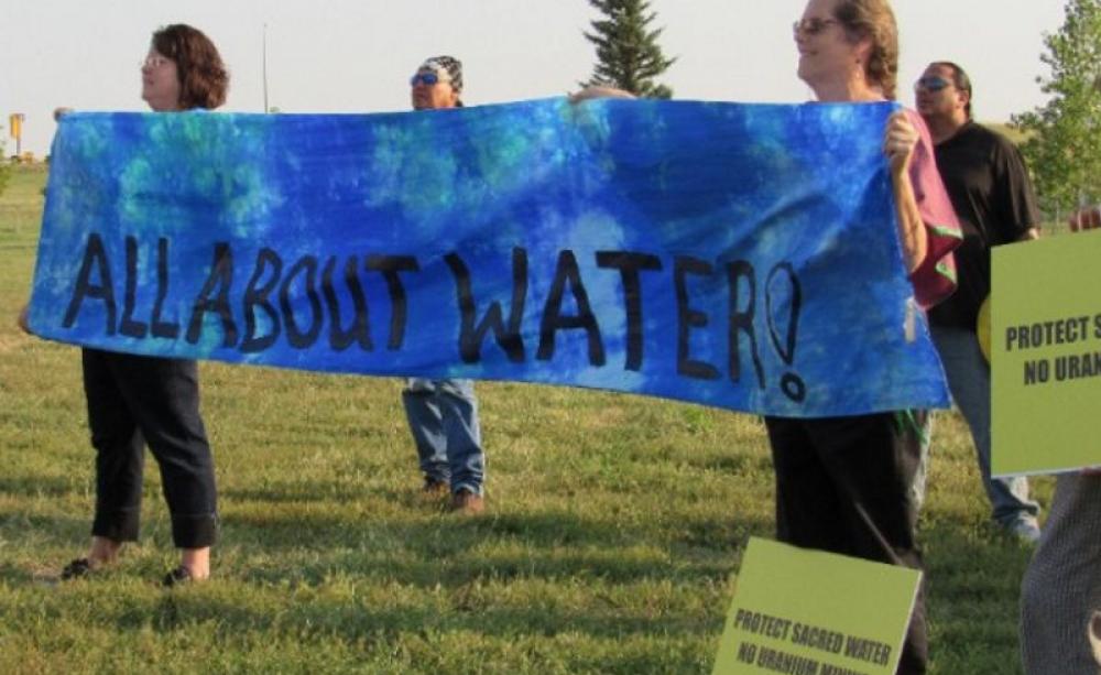 Colleen Brennan and Nancy Kile of the Sisterhood to Protect Sacred Water rally outside the Nuclear Regulatory Hearings in Crawford. Photo: Rosy Torres / WNV (CC BY).