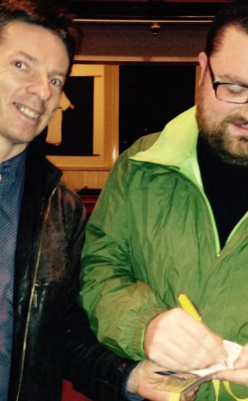 Hero of the hour: Nicky Lowden McCrimmon gives a signature shortly after his victory in defeating a feeble land reform bill, followed by a standing ovation of almost 300 SNP members. Photo: Jen Stout.
