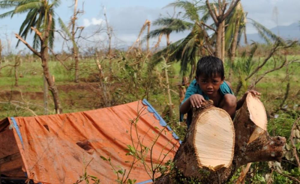 A survivor of Typhoon Haiyan, Leyte, Philippines, 10th November 2013. Photo: Arlynn Aquino / EU ECHO via Flickr (CC BY-NC-ND).