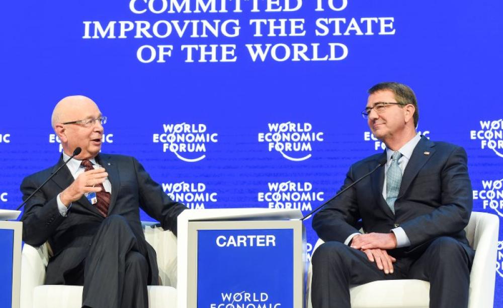 'Committed to Improving the State of the World' - of course they are! Secretary of Defense Ash Carter speaks with Mr. Klaus Schwab at WEF16 at Davos, Switzerland, 22nd January. Photo: US Army Sgt. 1st Class Clydell Kinchen / DoD via Flickr (CC BY).