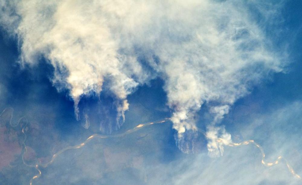 If laws currently being debated by Brazilian lawmakers are passed, we can expect huge tracts of the Amazon to go up in flames in coming years, like these 2011 fires along the Rio Xingu. Photo: NASA's Earth Observatory via Flickr (CC BY).