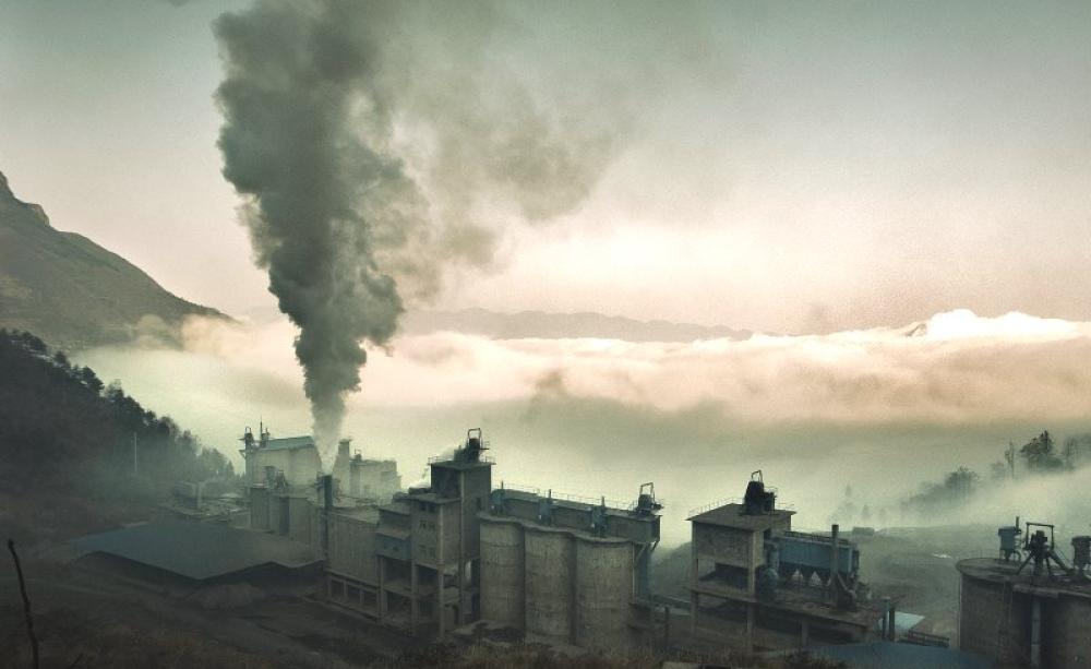 Even though most of China's industrial production is exported to the UK and other countries, we take no responsibility for the emissions in its power plants and factories, like this one in Chonqing. Photo: Jonathan Kos-Read via Flickr (CC BY-ND).