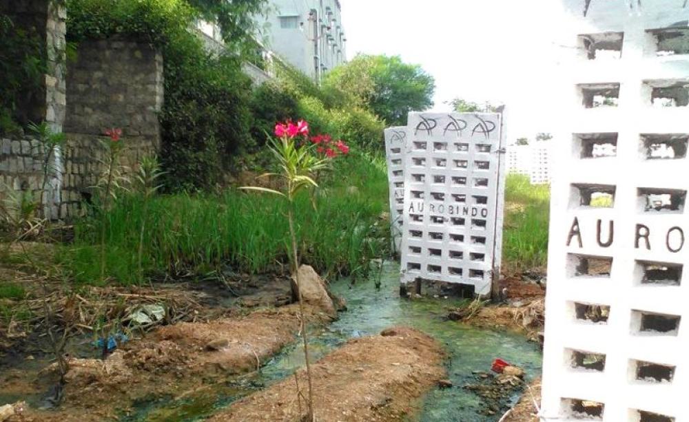 Pools of liquid still present outside the perimeter of the Aurobindo drug manufacturing plant near Hyderabad this month. Photo: Ecostorm.