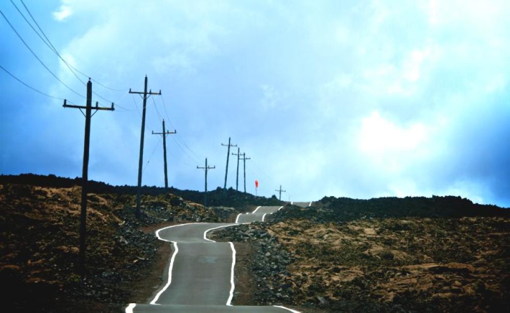 Up, up, up ... the access road to the observatories near the summit of Mauna Loa, the Hawai'ian volcano on which official measurements of global CO2 concentrations are taken. Photo: Dave Strom via Flickr (CC BY-NC-ND).
