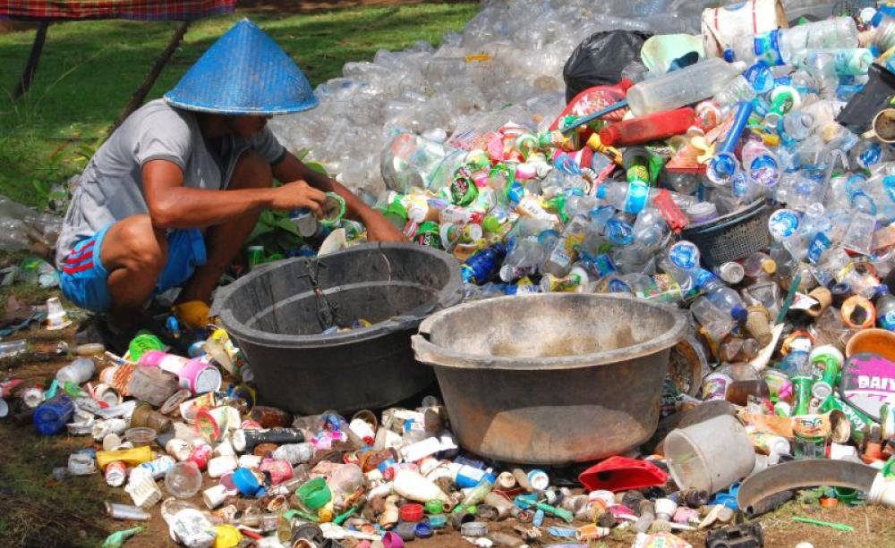 Plastic waste being sorted by hand in Babakan, West Java, Indonesia. Photo: Ikhlasul Amal via Flickr (CC BY-NC).