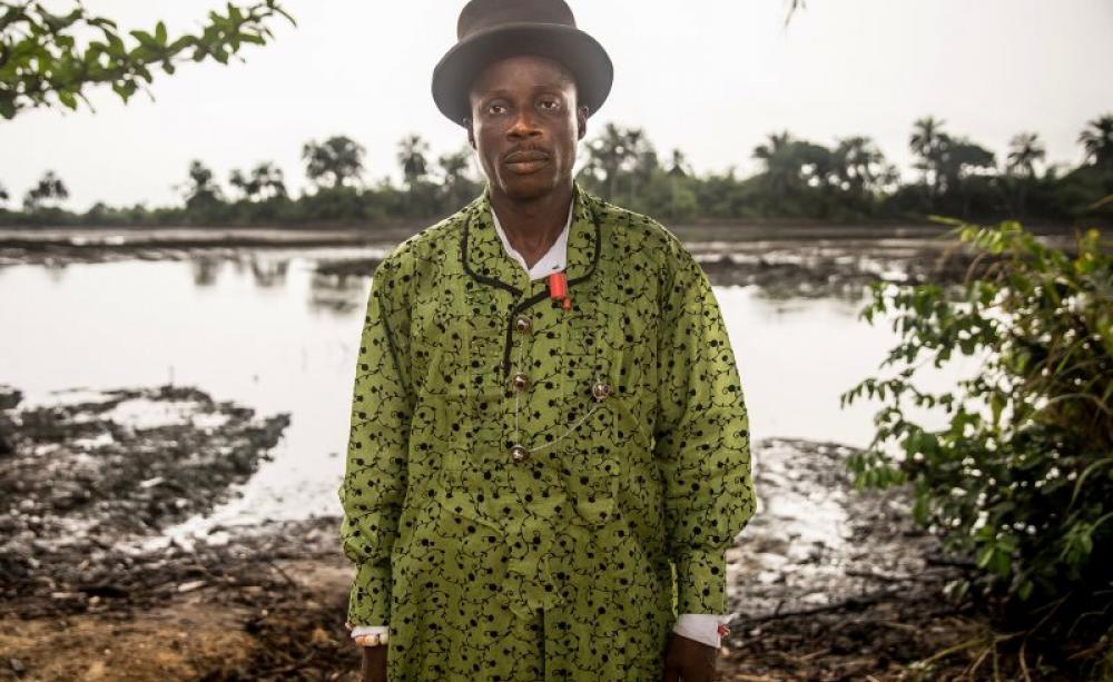 Eric Dooh from Goi, plaintiff in the Dutch court case against Shell for oil pollution in the Niger Delta, Nigeria, a biodiversity hotspot in which conflict has been raging for decades. Photo: Milieudefensie / Akintunde Akinleye via Flickr (CC BY-NC-SA).