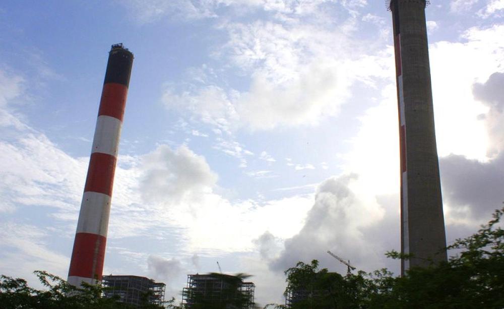 ADB's 'two finger salute' to the world on climate change: the Tata Mundra coal power station in India, under construction in 2010. Photo: Joe Athialy via Flickr (CC BY-NC-SA).