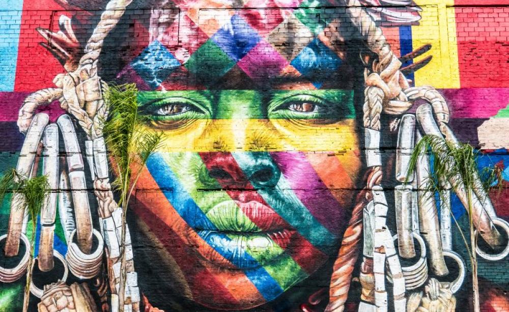 Mural in Rio de Janeiro, Brazil, in celebration of indigenous culture by the artist Eduardo Kobra. Photo: Stefano Ravalli via Flickr (CC BY-NC-SA).