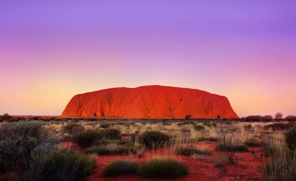 Uluru at sunset. Photo: Chris Ford via Flickr (CC BY-NC).
