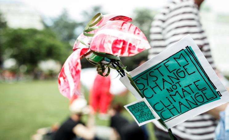 Tag reading 'system change not climate change'