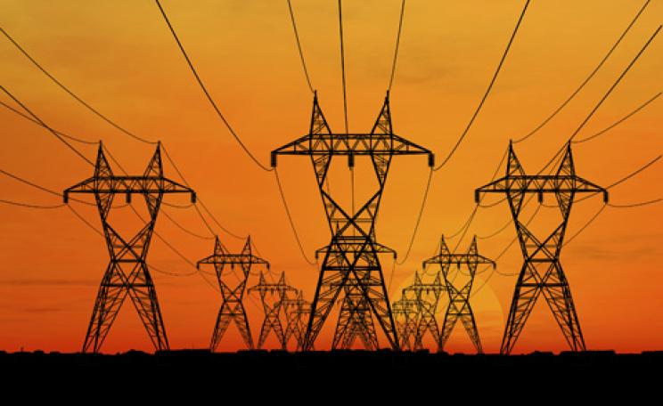 Electricity pylons at sunset