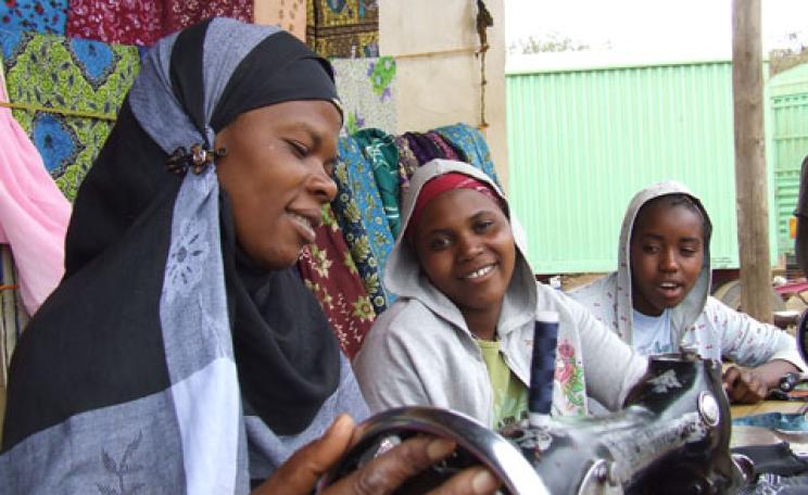 African women sewing