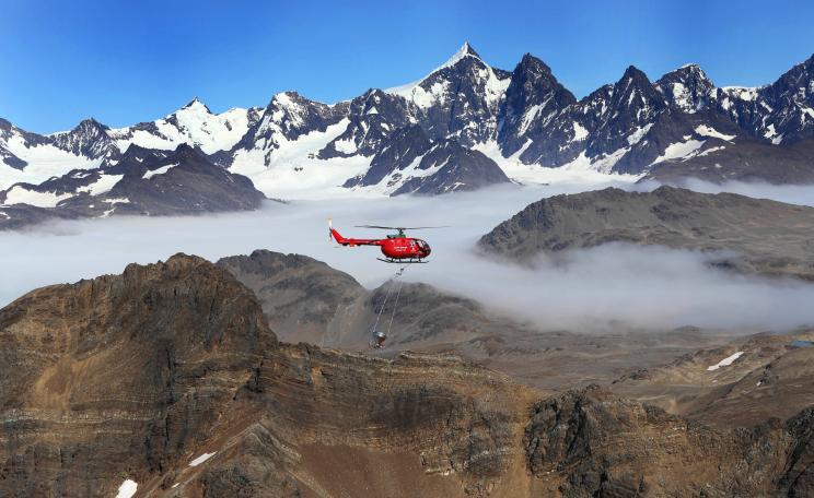 Helicopter spraying over South Geirgia