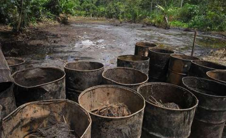 Texaco's signature, written in oil, at Lago Agrio in the Ecuadorian Amazon. Photo: Julien Gomba via Flickr.