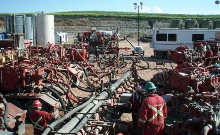 Thanks to higher methane emissions and lower production than declared, gas from fracking is as bad for climate as coal. Photo: Fracking the Bakken Formation in North Dakota. Credit: Joshua Doubek / Wikimedia Commons.