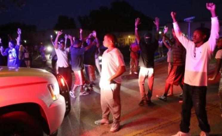 Ferguson - Hands Up Don't Shoot! Photo: via PFLP.