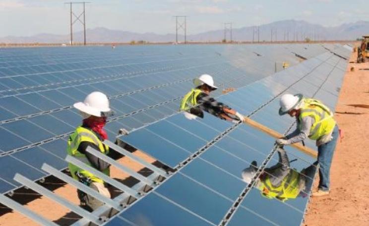 The Waltons are all for subsidies to large, centralised solar installations like this one by First Solar, in which they have a large shareholding. But they want to penalise small scale solar that challenges the corporate monopoly. Photo: Jumanji Solar via