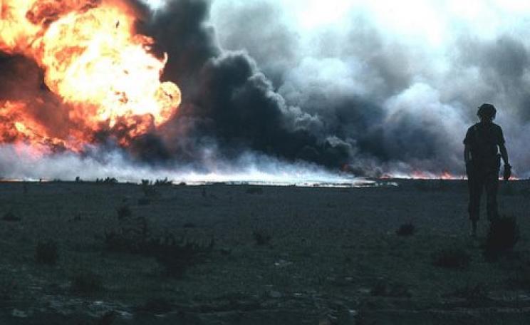 Burning oil field in Kuwait, Gulf War 1. Photo: VA Comm via Flickr (CC BY-NC 2.0).