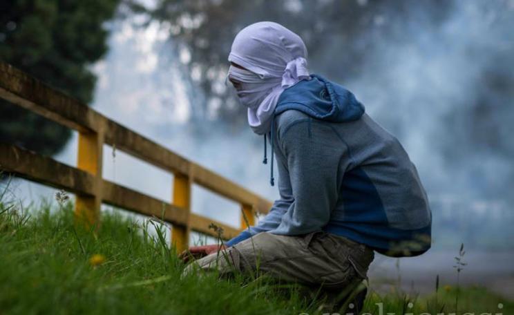 This time, it's tear gas: masked man at a farmers and student protest in Colombia, August 2013. Photo: Nick Jaussi via Flickr (CC BY-NC-SA).