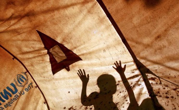 Internally displaced persons (IDPs) in Timor-Leste, seen here inside a UN Refugee Agency (UNHCR) tent, in Beto Timur, July 2008. Photo: UN Photo / Martine Perret.